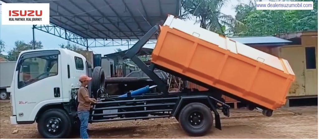 Truk Arm Roll Bak Sampah Isuzu NMR HD 65 PTO 150 PS Truk Arm Roll Bak Sampah Isuzu NMR HD 65 PTO 150 PS